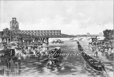 La passerelle du pont Aléxandre III.- Première opération du lancement:vue prise en aval.1900年博 アレクサンドル3世橋の歩道橋 － 架橋の初期段階：下流から見たところ