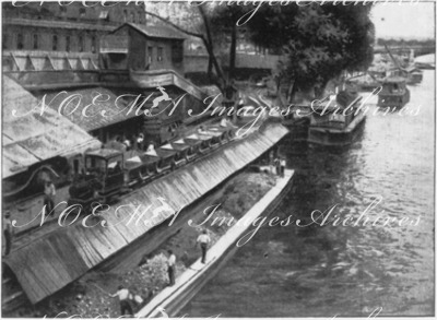 Le prolongement des lignes de la Cie d'Orléans.- Evacuation des déblais par bateaux clapets.(Quai d'Orsay.) 1900年博 オルレアン会社新線の延長 － ホッパ船による排出土の運び出し（オルセー河岸）