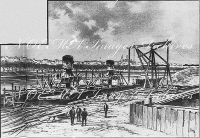 "La ligne Courcelles-Champ-de-Mars.Foncage de caissons, à l'air comprimé, pour la construction des piles du pont définitif." 1900年博 クールセル・シャン・ド・マルス線 本橋の支柱建設のため圧縮空気で打ち込まれる潜函